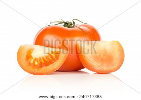Red Tomato And Two Slices Isolated On White Background