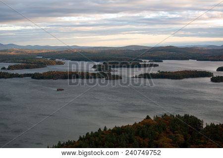 Mountains And Squam Lake In New Hampshire At Fall Time