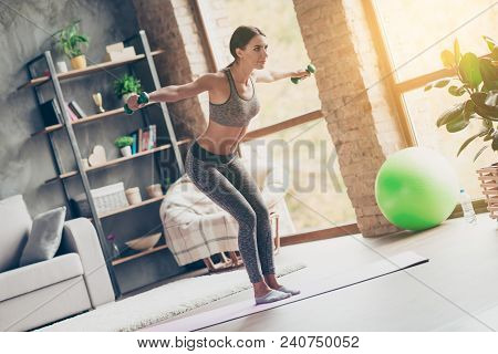 Low-angle Photo Of Sportive Strong Active Attractive Purposeful Ideal Woman With Excellent Body Figu