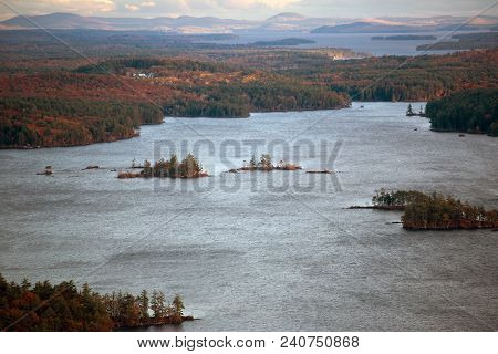 Mountains And Squam Lake In New Hampshire At Fall Time