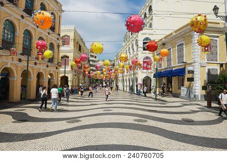 Macau, China - September 11, 2013: Unidentified People Walk By The Senado Square In Macau, China.
