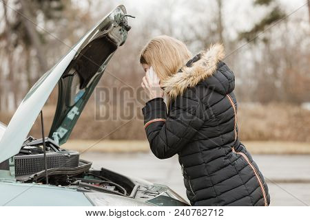 Accident And Breakdowns With Auto Concept. Broken Down Car, Blonde Woman Having Problem, Calling To 