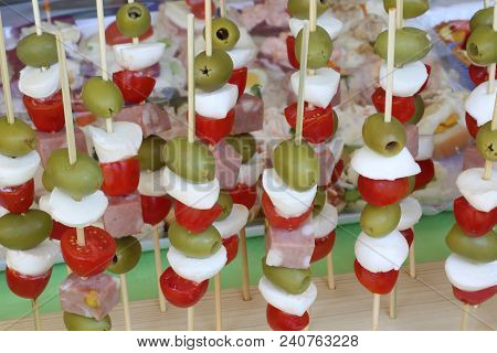 Italy Caprese Skewers With Tomato Mozzarella Olives And Salami Called Mortadella In Italy