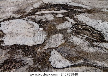 Broken Asphalt, Large Pits On The Road