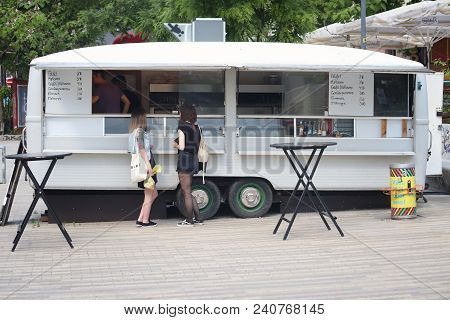 Dresden, Germany - May 10, 2018: People Visit A Falafel Food Trailer In Neustadt District Of Dresden