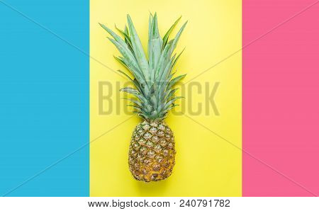 Ripe Pineapple With Bushy Green Leaves On Split Triple Tone Pink Blue Yellow Background. Summer Vaca