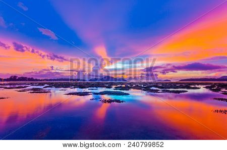 Scenery Sunrise Above The Coral Reef During Low Tide In Phuket Island. During Low Tide We Can See A 
