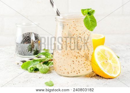 Natural Energy Drink, Chia Fresca, Infused Water Or Lemonade On Grey Stone Table Copy Space