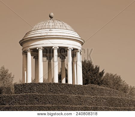 Neoclassical Dome Over The Hill And The Blue Sky With Sepia Toned Effect
