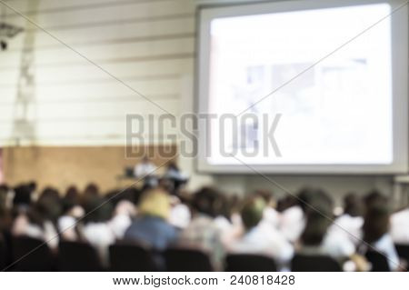 Blurred Abstract Background Of Business Or Educational Conference Seminar In Auditorium Hall