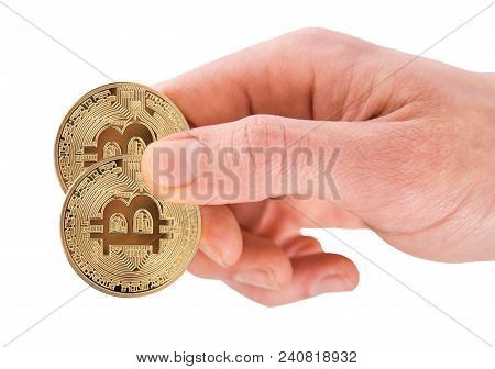Two Golden Bitcoin In A Man Hand. Digitall Symbol Of A New Virtual Currency Isolated On White Backgr