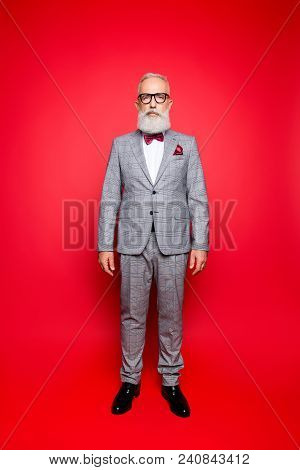 Portrait Of Cool, Virile, Harsh, Perfect Old Man In Checkered Grey Tuxedo And Eyewear, Standing, Iso