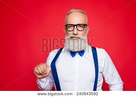 Portrait Of Elegant, Confident Macho, Old Barber, Stylist Draw Off Suspender With Thumb Finger, Look
