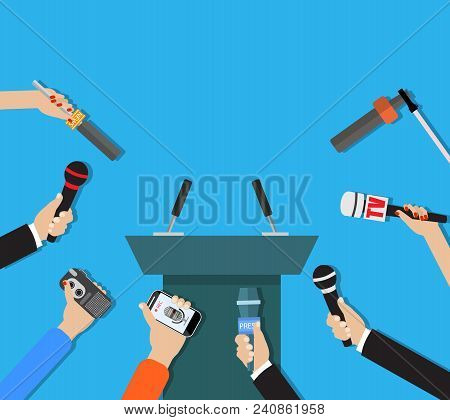 Press Conference. Hands Holding Microphones And Digital Voice Recorders. Tribune With Microphones. V