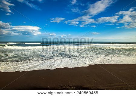 Halaktyr Beach. Kamchatka. Russian Federation. Dark Almost Black Color Sand Beach Of Pacific Ocean. 