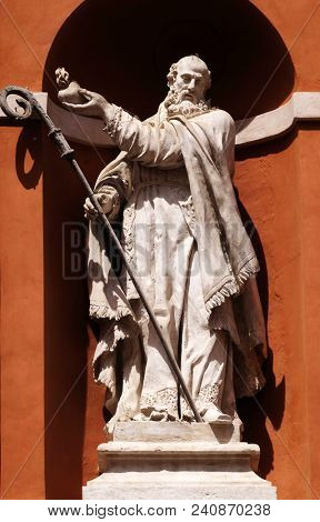 MODENA, ITALY - JUNE 04: Saint Barnabas statue on the portal of St. Barbabas Church, Italy on June 04, 2017.