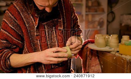 Professional Male Potter Making Mug In Pottery Workshop, Studio. Handmade, Art And Handicraft Concep