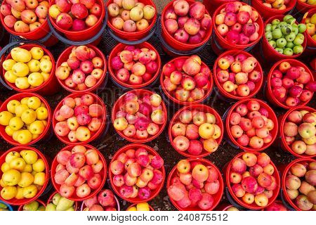 Bright Colored Apples In Buckets, Top View