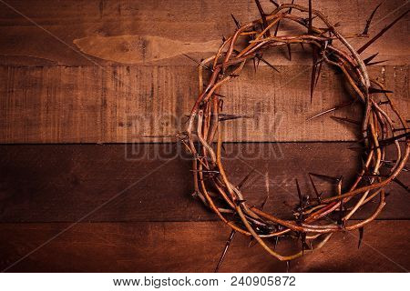 An Authentic Crown Of Thorns On A Wooden Background. Easter Theme