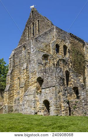 Part Of The Ruins Of The Historic Battle Abbey In The Town Of Battle In East Sussex.  The Abbey Is L