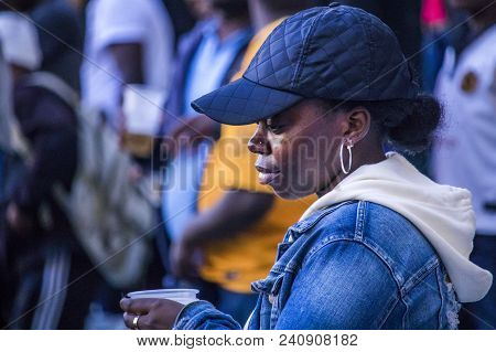 Cape Town, South Africa, 12 May 2018 - Diverse South African Football Supporter Keeping Warm During 