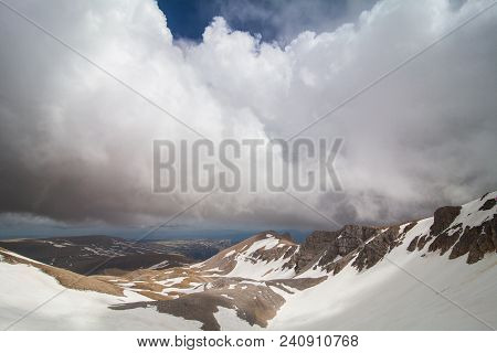 The Foothills Of The Snowy Peaks Of The High Mountain