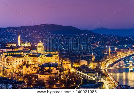 Night View Of The City Of Budapest With The Royal Castle, And The Hills Of Buda
