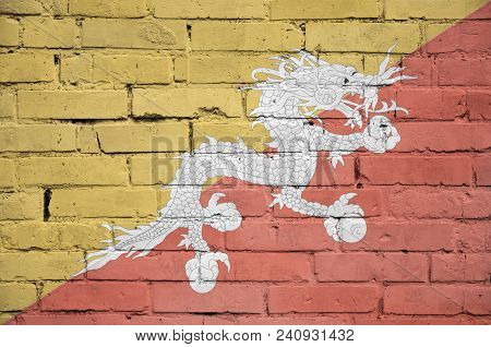 Bhutan Flag Is Painted Onto An Old Brick Wall