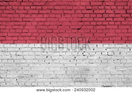 Indonesia Flag Is Painted Onto An Old Brick Wall