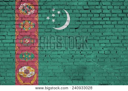 Turkmenistan Flag Is Painted Onto An Old Brick Wall
