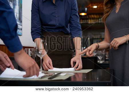 Cropped Image Of Restaurant Owner Explaining Work To Employees