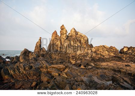 Morning Time On The Sea Beach, Rocky Shore