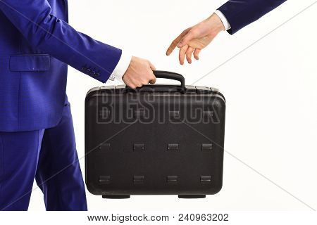 Male Hand Carry Briefcase For Exchange Or Offering Bribe. Handover Of Case In Hands Of Business Part