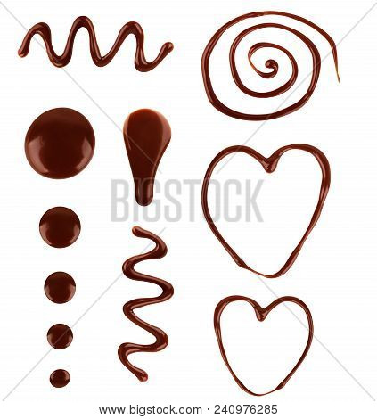 A Set Of Chocolate Drops Of Various Shapes With A White Background