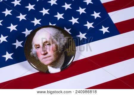London, Uk - April 27th 2018: A George Washington Badge Pictured Over The Usa Flag, On 27th April 20