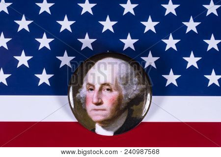 London, Uk - April 27th 2018: A George Washington Badge Pictured Over The Usa Flag, On 27th April 20