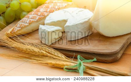 Happy Shavuot, Background With Dairy Products On Wooden Tabletop
