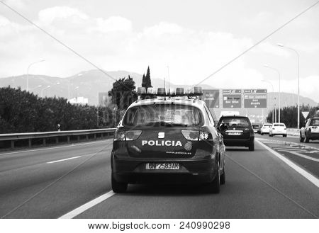 Palma De Mallorca, Spain - May 10, 2018: Drive Pov On The Police Policia Car Surveying The Highway O