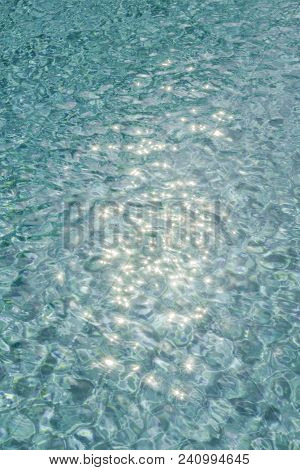 Colorful Twinkling Beach Reflect Bokeh Light Background.