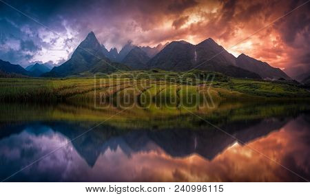 Rice Fields On Terraced With Mount Fansipan Background At Sunset In Lao Cai, Northern Vietnam. Fansi