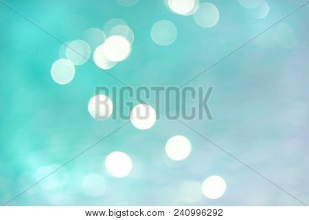 Colorful Twinkling Beach Reflect Bokeh Light Background.