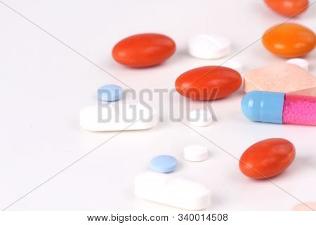 Drugs And Medicines - Different Color Pills On White Background