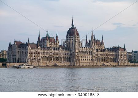 View Of Historical Building Of Hungarian Parliament On Danube River In Budapest, Hungary, Europe.