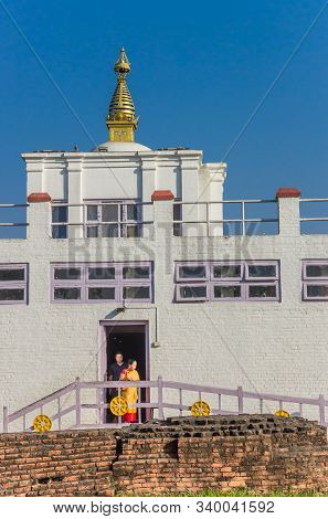Lumbini, Nepal - November 09, 2019: People Exiting The Mayadevi Temple In Lumbini, Nepal