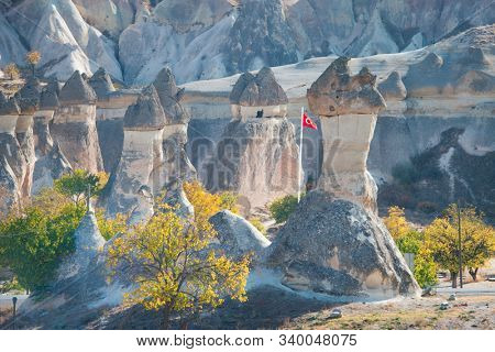Fairy Chimneys in Cappadocia in autumn foliage - Nevsehir, Turkey 