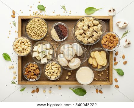 Vegan Protein Sources. Wooden Tray With Set Of Soybean Products, Nuts, Legumes And Mushrooms, Top Vi