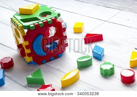 Kids Educational Developing Toys Frame On White Background. Top View. Flat Lay. Copy Space For Text