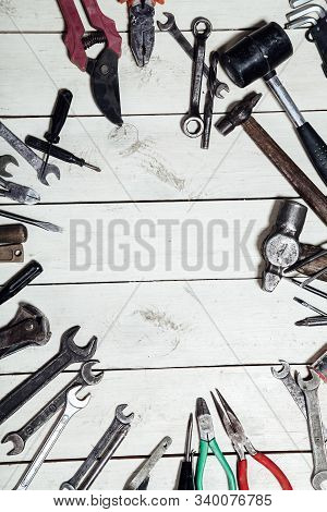 Construction Tools For Repair Hammers Screwdriver On The Boards