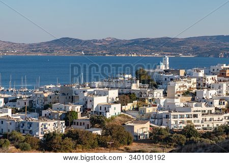 Church Houses And Bay In Adamas Village