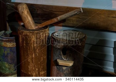 Close Up Old Wooden Bee Hammer And Bee-keeprs Equipment